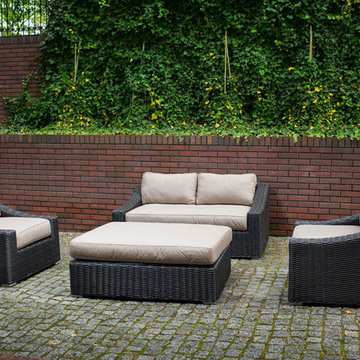 Toja Patio Furniture - Tuscan Love Seat Set - Red Brick Wall
