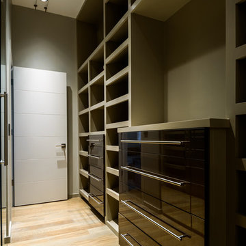 Modern Walk-In Closet in Norman, OK with UltraCraft Cabinetry