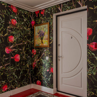 Exemple d'une porte d'entrée éclectique avec un mur multicolore, une porte simple, une porte blanche et un sol multicolore.