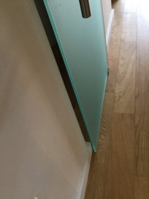 Barn door bathroom that seals? take off baseboard?