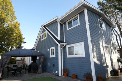 Example of an arts and crafts exterior home design in Vancouver