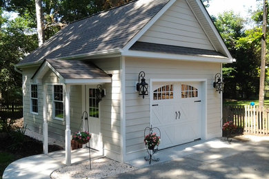 Photo of a mid-sized traditional detached one-car garage in Richmond.