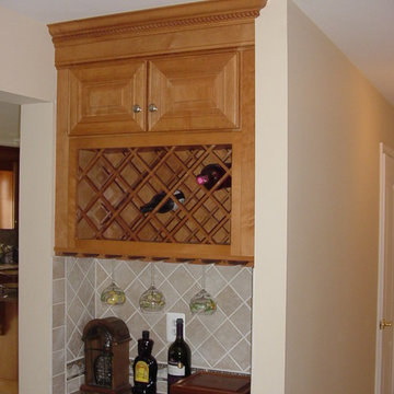 Traditional Maple Kitchen with Island and Wine Rack in Hunt Valley, MD
