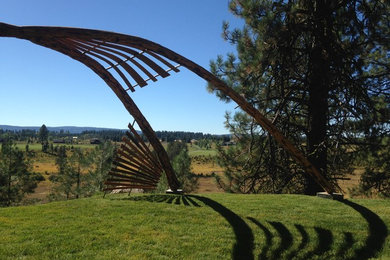 Inspiration for an eclectic full sun backyard landscaping in Boise for summer.