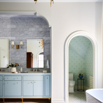 Light Blue Vanity with Marble Backsplash in Boston Bath