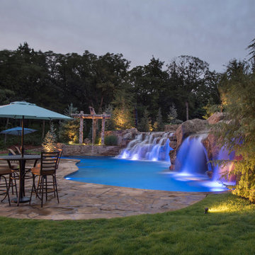 Multi-Level Pool with Rope Swing, Sunken Fire Pit, Waterfalls & Swim Up Bar
