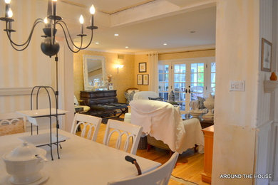 Example of a french country dining room design in Orange County