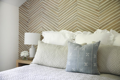 Inspiration for a transitional wallpaper bedroom remodel in New York