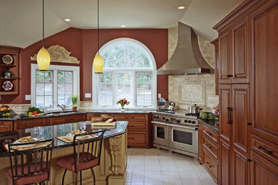 Open concept kitchen - large traditional u-shaped ceramic tile and white floor open concept kitchen idea in Burlington with a drop-in sink, beaded inset cabinets, medium tone wood cabinets, marble countertops, stainless steel appliances and an island