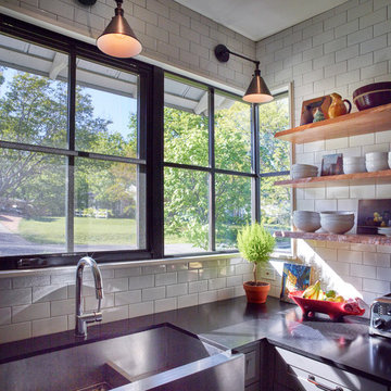 Kitchen corner window and reclaimed pecan live edge shelves.