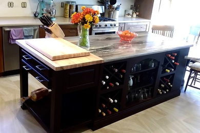 Inspiration for a mid-sized craftsman l-shaped ceramic tile and beige floor eat-in kitchen remodel in Other with a double-bowl sink, shaker cabinets, medium tone wood cabinets, granite countertops, stainless steel appliances and an island