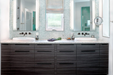 Walk-in shower - large modern master green tile and porcelain tile porcelain tile and gray floor walk-in shower idea in San Francisco with a one-piece toilet, white walls, flat-panel cabinets, dark wood cabinets and a drop-in sink