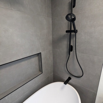 Ultra-Modern Smart Bathroom with Terrazzo Floor & Oval Soaking Tub