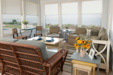 Example of a large arts and crafts light wood floor sunroom design in Seattle