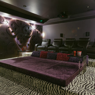 Inspiration for a large modern enclosed home cinema in Edmonton with purple walls, carpet, a projector screen and multi-coloured floors.
