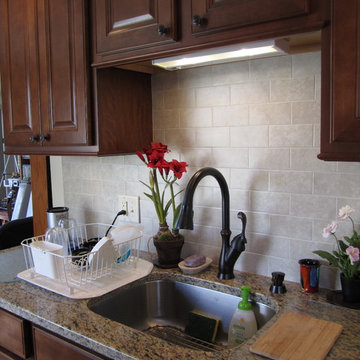 Traditional Lake House Toffee finish kitchen featuring a non-traditional layout