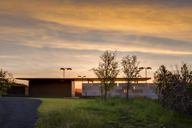 Minimalist stone exterior home photo in Austin