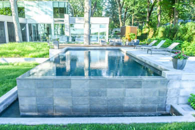 Inspiration for a contemporary pool remodel in Montreal