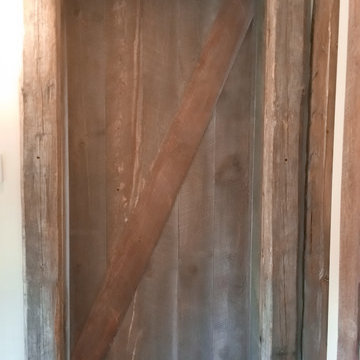 Interior barn door in reclaimed Fir
