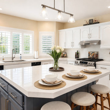 White Quartz Kitchen with Navy Island and Plantation Shutters
