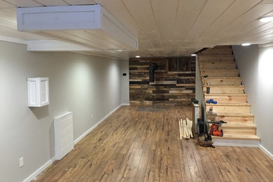 Basement - rustic basement idea in Other