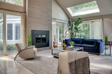 Inspiration for a large modern open concept beige floor family room remodel in New York with a music area, beige walls, a standard fireplace, a metal fireplace and a wall-mounted tv