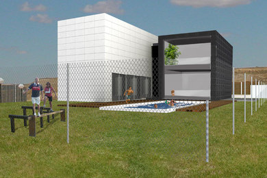 Example of a minimalist exterior home design in Other