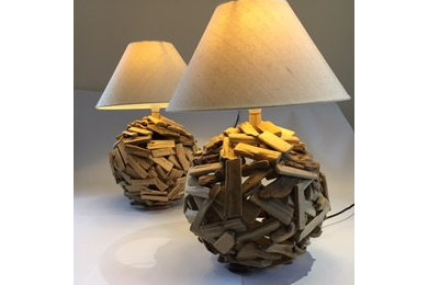 A pair of driftwood sphere lamps