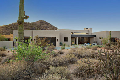 Southwest home design photo in Phoenix