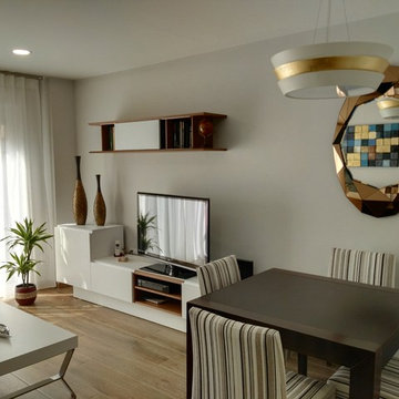 Nueva zona de televisión y mesa de comedor.