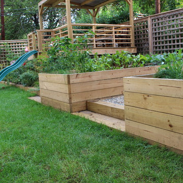 vegetable beds and children's playhouse