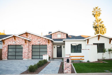 Inspiration for a large cottage home design remodel in Phoenix