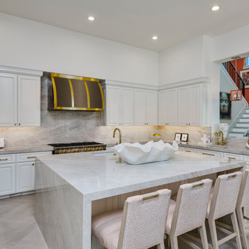 A modern kitchen all in Benjamin Moore "Simply White"