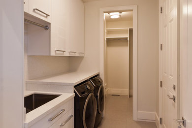 Inspiration for a laundry room remodel in New York