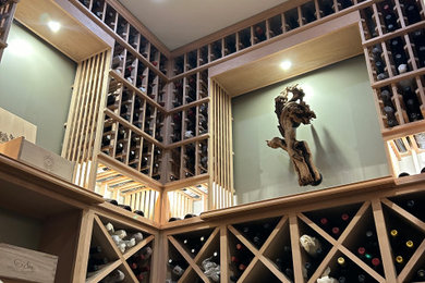Mid-sized elegant porcelain tile wine cellar photo in Cincinnati