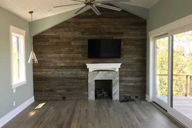 Inspiration for a cottage master bedroom remodel in Charleston with brown walls