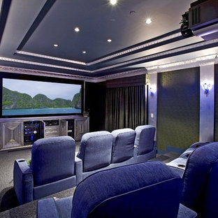 Inspiration for an eclectic home theater remodel in Santa Barbara with a projector screen