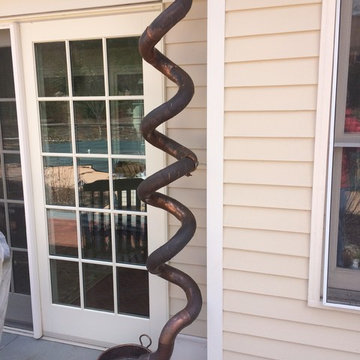 The Roofer's copper Downspouts