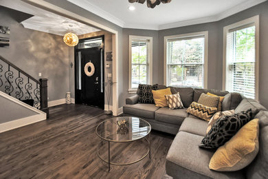 Inspiration for a large transitional formal open concept living room in Chicago with grey walls, dark hardwood floors, no fireplace, no tv and brown floor.