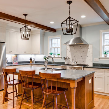 Warm and Inviting Kitchen with Soapstone Island and Wood Accents