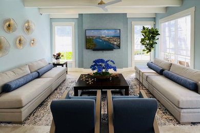 Example of a beach style living room design