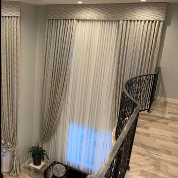 Curved Window Treatment with Cornice Board Styling
