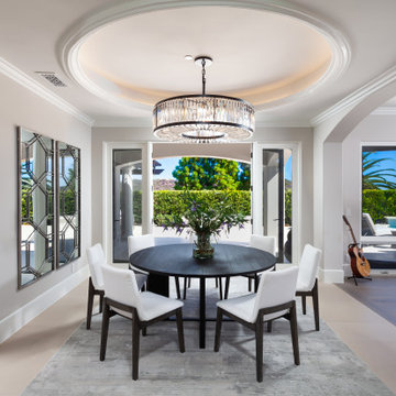 Formal Dining Room with Oval Cove Ceiling, LED Accent Lighting & Pool View – New