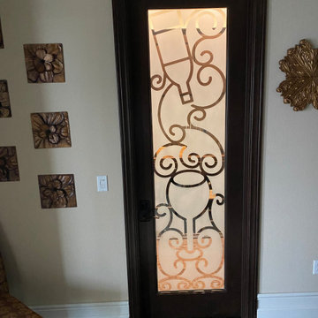 Reverse etched glass door