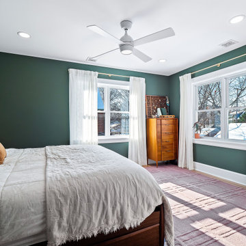 Light-Filled Green Primary Bedroom in Lakewood