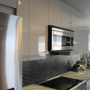 Contemporary high gloss kitchen in downtown luxury condo