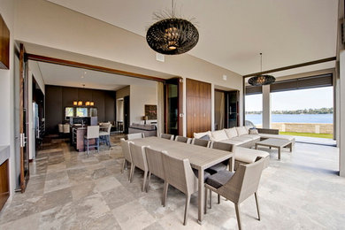 Design ideas for a contemporary sunroom in Perth with travertine floors.