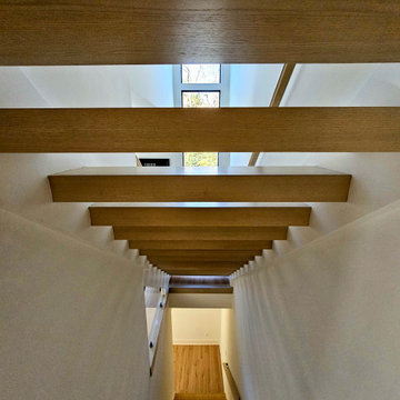 Project #111 | Open-Riser Staircase with Glass Panel Detail