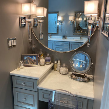 This round mirror modernizes the traditional style dressing table