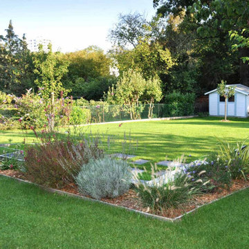 Grand jardin avec terrasse lounge